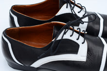 Nashville tango shoes has black and white leather.dance shoes has suede sole.ballroom shoes has black and white leather.