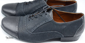 Black dancing shoes with leather or suede insole