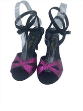 Pink Italian fabric and black leather dance shoes. Black and pink tango shoes. Pink snakeskin ballroom shoes has leather sole.